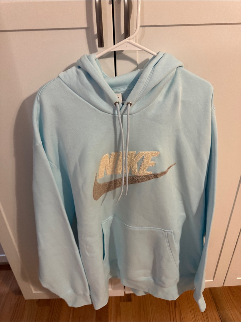 Nike Light Blue Hoodie with textured swoosh Logo